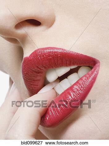 Stock Photo - Close up of glamorous Caucasian woman's lips. Fotosearch