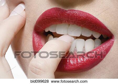 Close up of glamorous Caucasian woman's lips View Large Photo Image Stock Photo - Close up of glamorous Caucasian woman's lips. Fotosearch