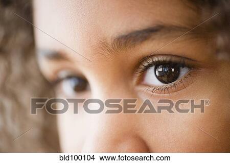 Picture - Close up of mixed race girl's face. Fotosearch