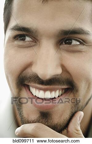 Close up of smiling man with beard View Large Photo Image Stock Image - Close up of smiling man with beard . Fotosearch