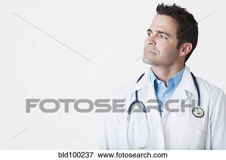Serious mixed race doctor View Large Photo Image Stock Photo - Serious mixed race doctor. Fotosearch