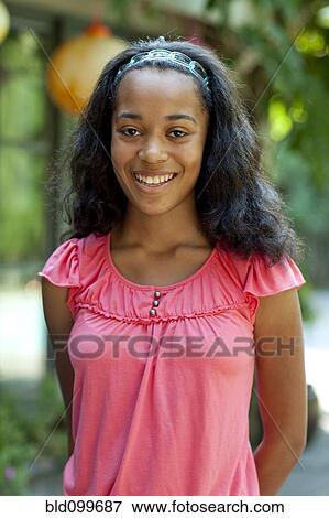 Smiling African American girl View Large Photo Image Stock Photo - Smiling African American girl. Fotosearch