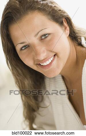 Stock Image - Smiling Brazilian woman. Fotosearch