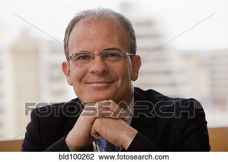 Stock Image - Smiling Chilean businessman. Fotosearch