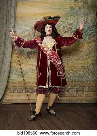 Actor dressed in old-fashioned costume on stage View Large Photo Image Stock Image - Actor dressed in old-fashioned costume on stage. Fotosearch