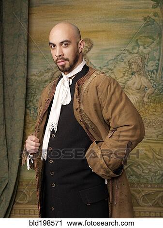 Stock Image - Actor dressed in old-fashioned costume on stage. Fotosearch