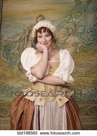 Actress dressed in old-fashioned costume on stage View Large Photo Image Stock Photography - Actress dressed in old-fashioned costume on stage. Fotosearch