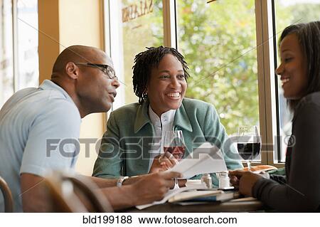 African American co-workers working in restaurant View Large Photo Image Stock Photo - African American co-workers working in restaurant. Fotosearch