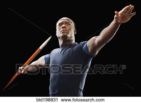 African American man holding track and field javelin View Large Photo Image Stock Image - African American man holding track and field javelin. Fotosearch
