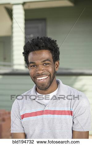 African American man smiling outdoors View Large Photo Image Stock Image - African American man smiling outdoors. Fotosearch