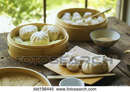 Asian dumpling in steamer with cabbage View Large Photo Image Stock Photography - Asian dumpling in steamer with cabbage. Fotosearch