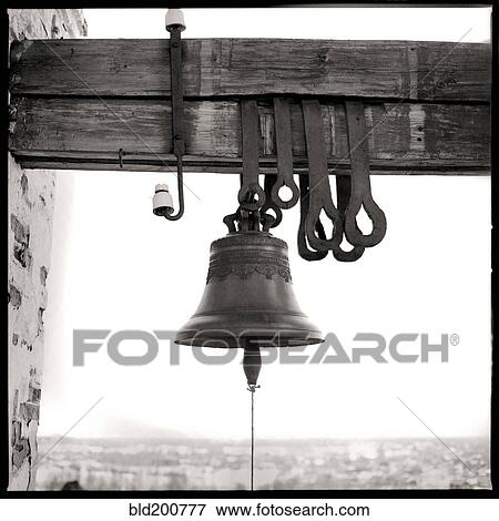 Bell hanging from wooden beam View Large Photo Image Stock Photo - Bell hanging from wooden beam. Fotosearch