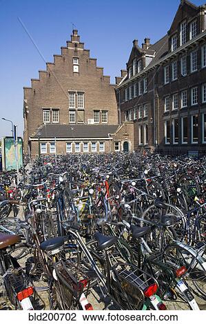 Bicycles parked in Dutch plaza View Large Photo Image Stock Image - Bicycles parked in Dutch plaza. Fotosearch