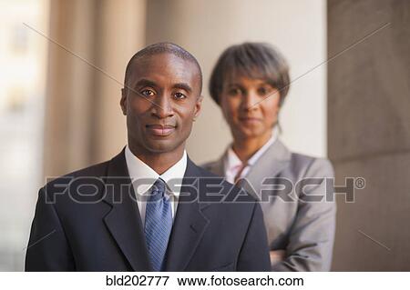 Stock Photo - Black business people outdoors. Fotosearch