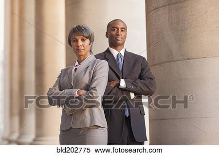 Stock Photography - Black business people outdoors. Fotosearch