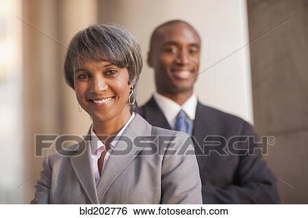 Stock Photograph - Black business people smiling. Fotosearch