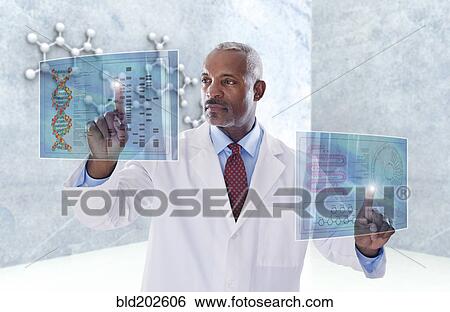 Stock Photograph - Black doctor using digital display. Fotosearch