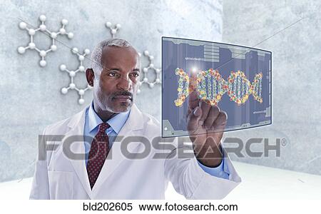 Stock Photography - Black doctor using digital display. Fotosearch
