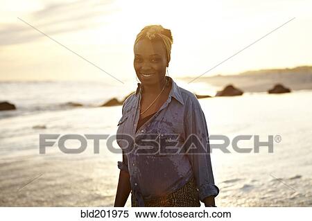 Black woman enjoying the beach View Large Photo Image Stock Photography - Black woman enjoying the beach. Fotosearch