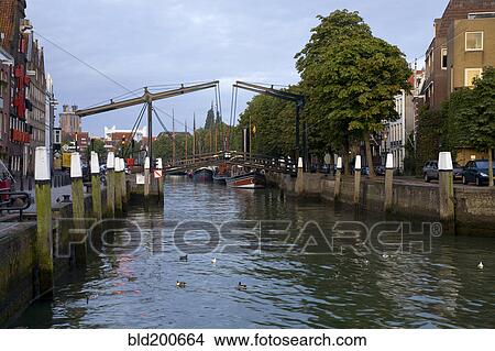 Picture - Boats in Amsterdam canals. Fotosearch