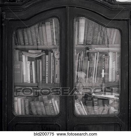 Books in wooden cabinet View Large Photo Image Stock Photography - Books in wooden cabinet. Fotosearch