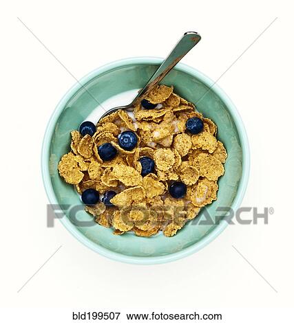Stock Photo - Bowl of healthy cereal with fruit. Fotosearch