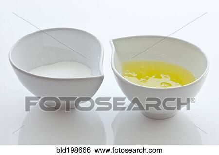 Bowls with sugar and egg whites View Large Photo Image Stock Photograph - Bowls with sugar and egg whites. Fotosearch