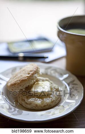 Butter melting on biscuit View Large Photo Image Stock Photo - Butter melting on biscuit. Fotosearch