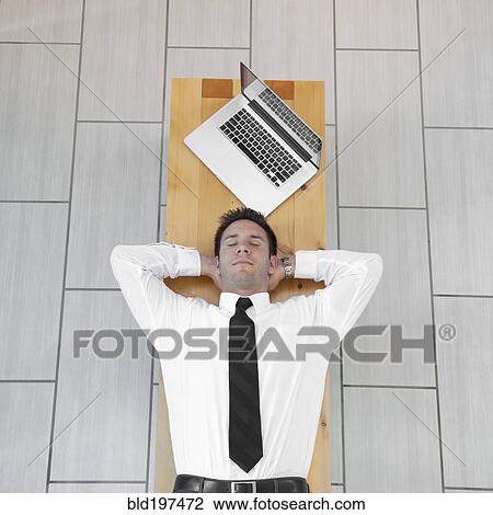 Caucasian businessman sleeping on bench View Large Photo Image Stock Image - Caucasian businessman sleeping on bench. Fotosearch