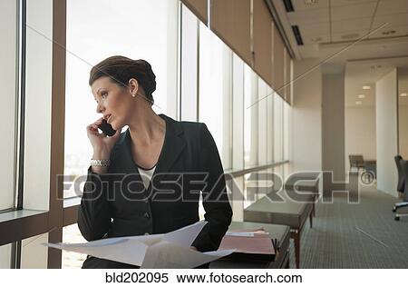 Caucasian businesswoman working in conference room View Large Photo Image Stock Photography - Caucasian businesswoman working in conference room. Fotosearch