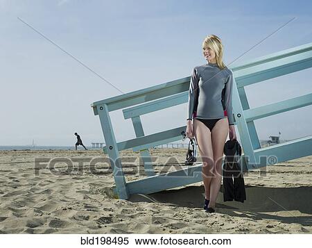 Caucasian lifeguard standing at lifeguard station View Large Photo Image Stock Photography - Caucasian lifeguard standing at lifeguard station. Fotosearch