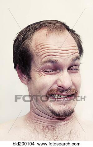 Picture - Caucasian man crying. Fotosearch