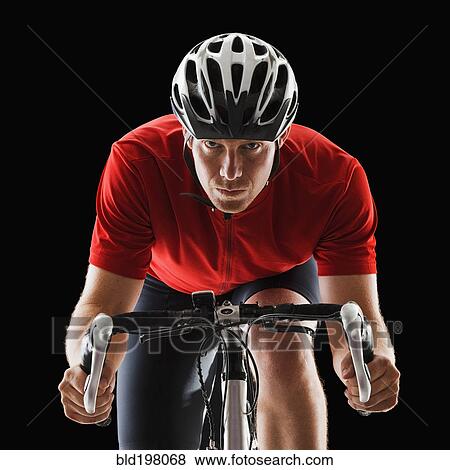 Caucasian man riding bicycle View Large Photo Image Stock Photo - Caucasian man riding bicycle. Fotosearch