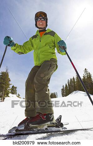Caucasian man skiing View Large Photo Image Stock Photo - Caucasian man skiing. Fotosearch