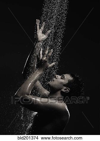 Caucasian man standing in shower View Large Photo Image Picture - Caucasian man standing in shower. Fotosearch