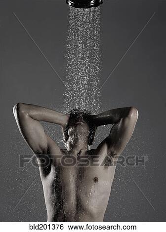 Caucasian man standing in shower View Large Photo Image Stock Photograph - Caucasian man standing in shower. Fotosearch