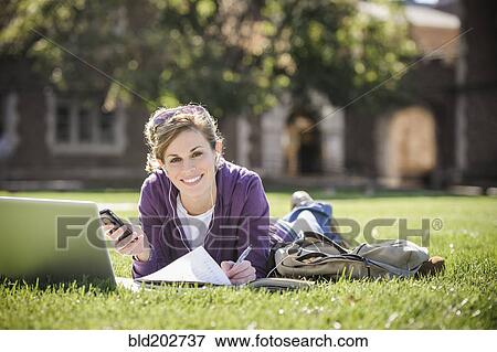 Caucasian student studying on campus View Large Photo Image Stock Photo - Caucasian student studying on campus. Fotosearch