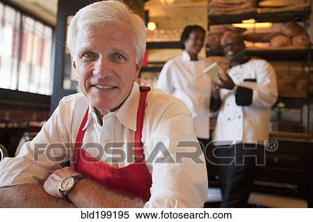 Caucasian waiter sitting in restaurant View Large Photo Image Stock Photography - Caucasian waiter sitting in restaurant. Fotosearch