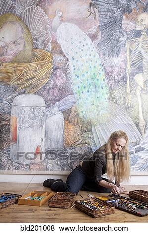 Caucasian woman drawing mural on wall View Large Photo Image Stock Photo - Caucasian woman drawing mural on wall. Fotosearch