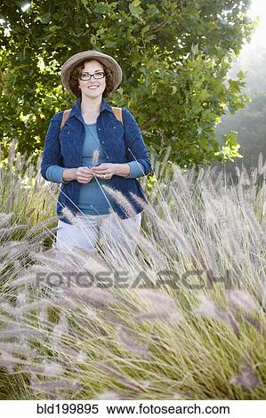 Caucasian woman hiking in remote area View Large Photo Image Stock Photography - Caucasian woman hiking in remote area. Fotosearch