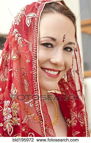 Stock Image - Caucasian woman in traditional Indian clothing. Fotosearch