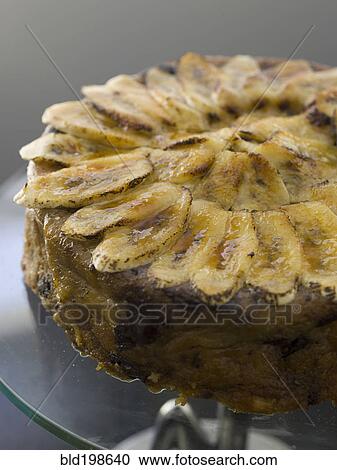 Stock Image - Close up of banana coffee cake. Fotosearch