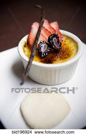 Picture - Close up of berry souffle on plate. Fotosearch