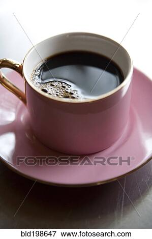 Stock Photo - Close up of coffee in cup. Fotosearch