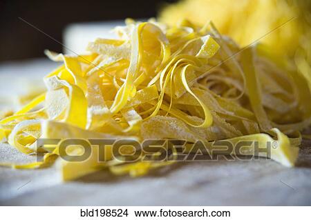 Close up of fresh pasta noodles View Large Photo Image Picture - Close up of fresh pasta noodles. Fotosearch