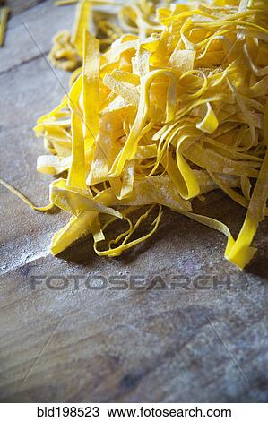 Stock Image - Close up of fresh pasta noodles. Fotosearch