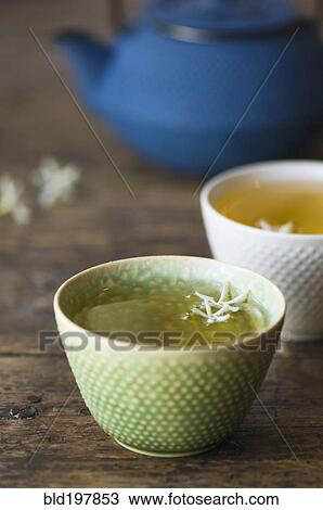 Stock Image - Close up of jasmine tea in teacup. Fotosearch