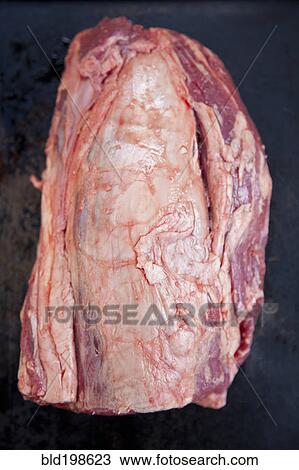 Stock Image - Close up of raw filet mignon steak. Fotosearch