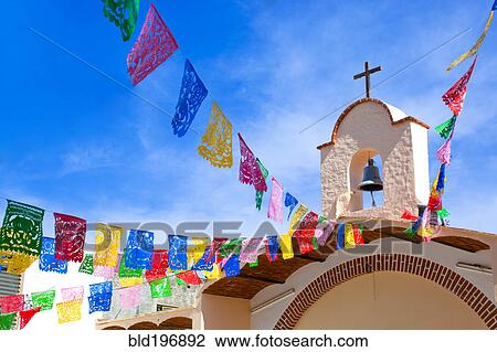 Stock Image - Colorful flags decorating church. Fotosearch