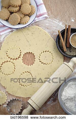 Cookies, cookie dough and rolling pin View Large Photo Image Stock Photo - Cookies, cookie dough and rolling pin. Fotosearch